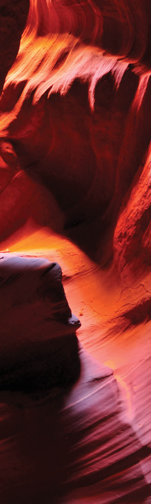 A woman explores Antelope Canyon in Utah 